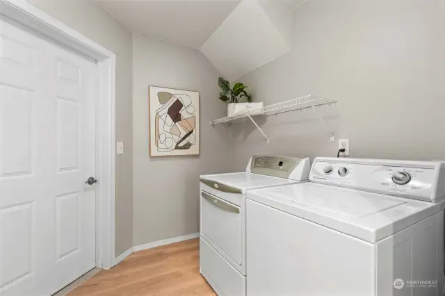 Full size laundry room with additional storage area not shown here. It's also a mud room just off the garage. Washer and dryer stay!