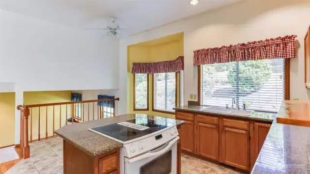 Dining room flows into your kitchen featuring ample storage and all appliances stay.