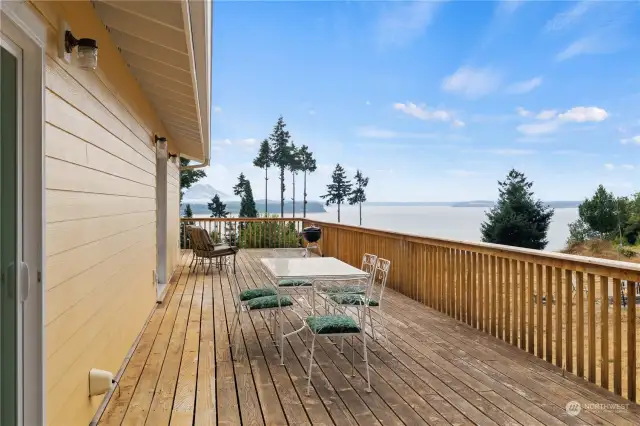 Wrap-around deck provides unlimited water and Mt. Rainier views