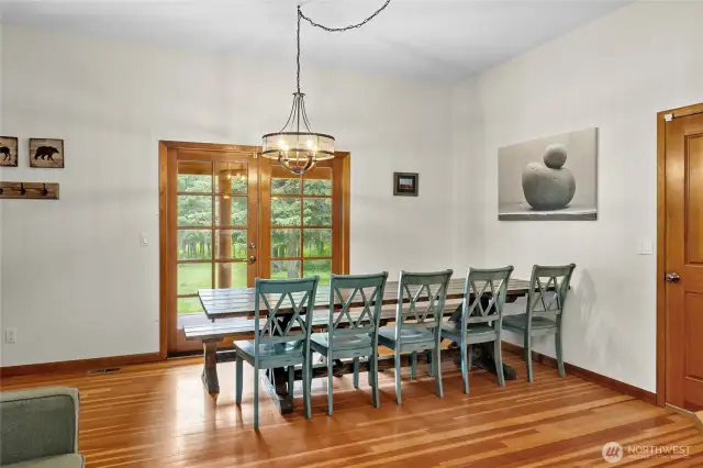 Dining area leads out to wrap around deck.
