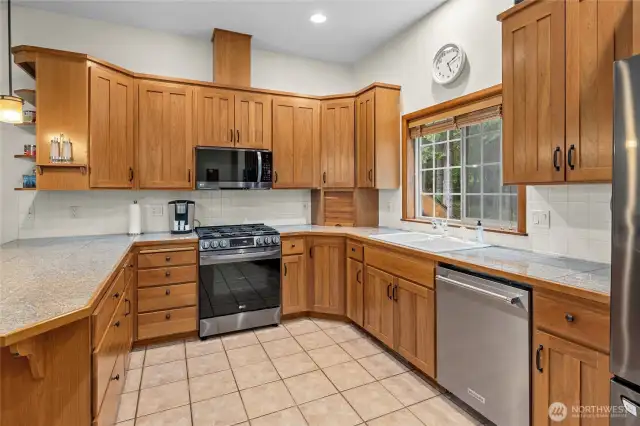 Abundance of counter space and SS appliances.