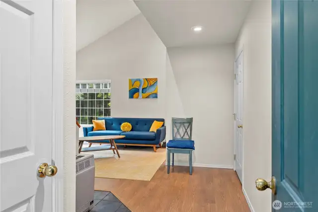 Inviting open-layout guest house features high vaulted ceilings.