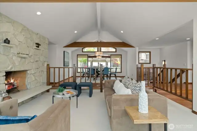 Sunken living room with fireplace.