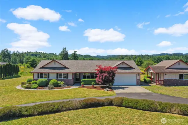 Home has circular drive and unattached studio with 1/2 bath!