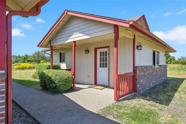 Studio has large living space with vaulted ceilings & 1/2 bath.