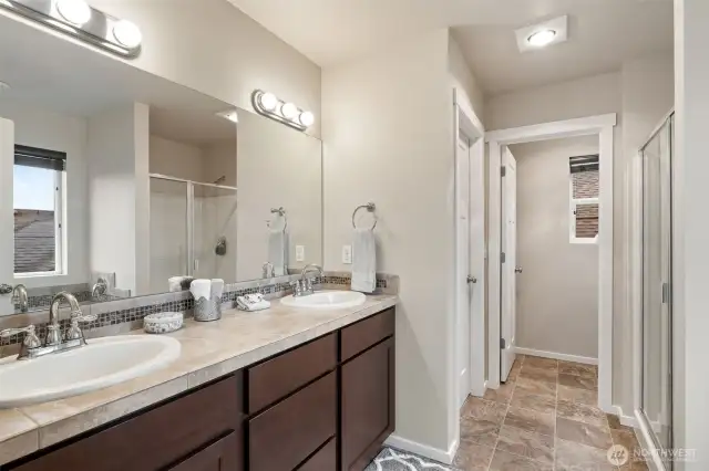 Five Piece Primary bath with Dual Vanities.