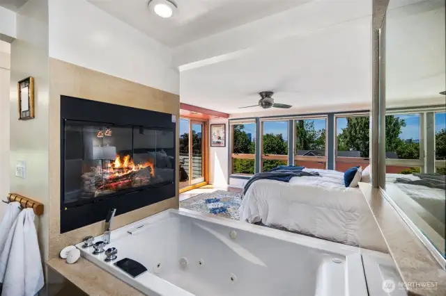 Enjoy a view and the cozy fireplace while you're in the bath!