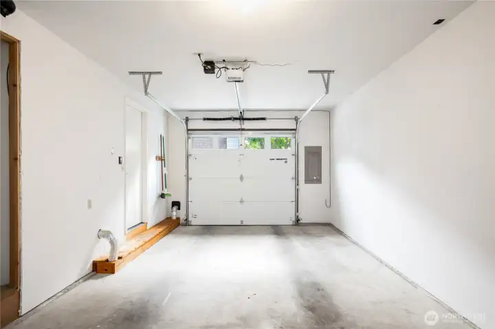 The attached one-car garage has an automatic garage door opener and a nice bonus storage area too.