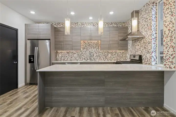 Large kitchen island with bar for seating