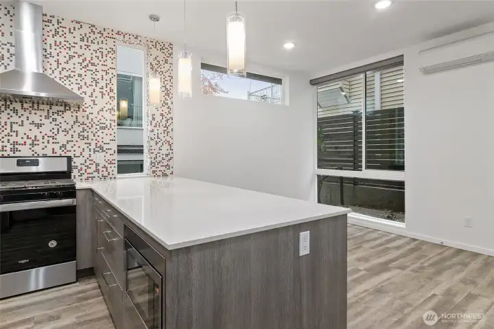 Modern, natural light, high ceilings, floor to ceiling windows, efficient mini-split heating and cooling, and on-demand tankless water heater for modern comfort.