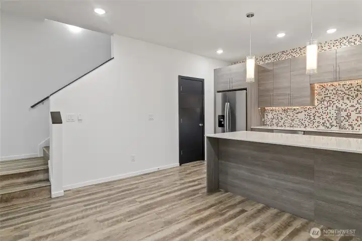 Living room and kitchen, large walk in closet off kitchen for pantry and storage