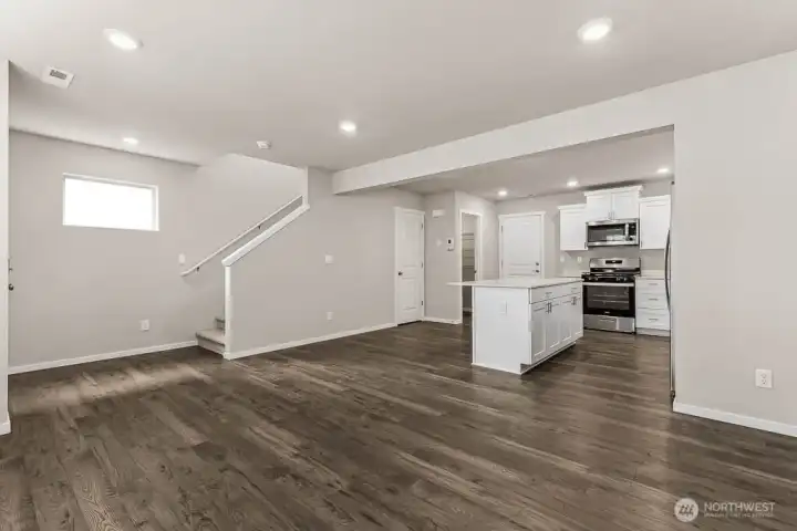 Photo is for representation purposes only. No carpet downstairs and kitchen island LOVE!