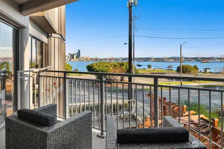 Primary bedroom with private deck and views