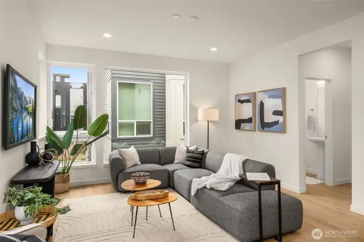 Bright dining area situated perfectly between the kitchen and living room for a natural social flow