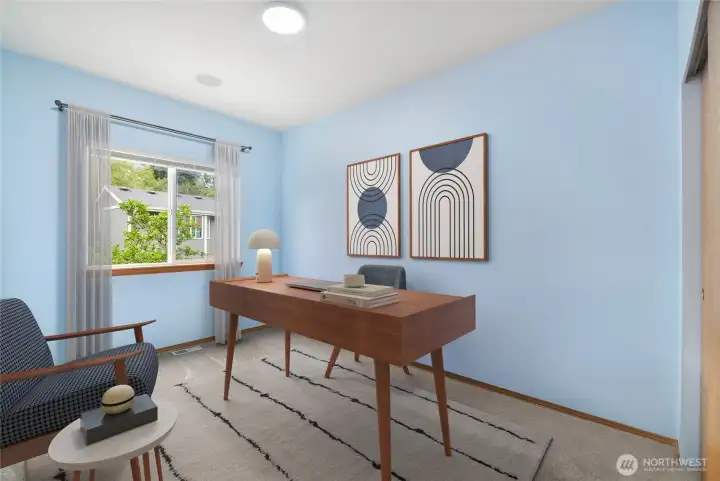 Main floor bedroom is perfect for a guest room/home office/playroom.  Possibilities are endless.