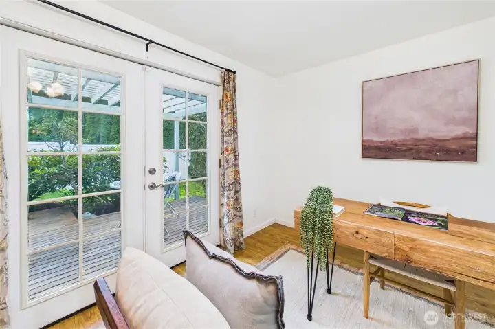 This space is so sweet, and versatile - home office or hobby room - great natural light!