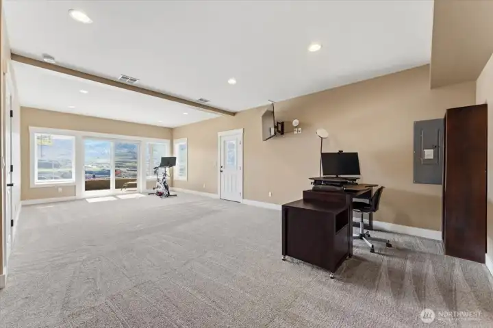 Lower Level Bonus Room or 3rd Bedroom. New carpet installed.  Access to spacious patio, hot tub, and big Columbia River views!