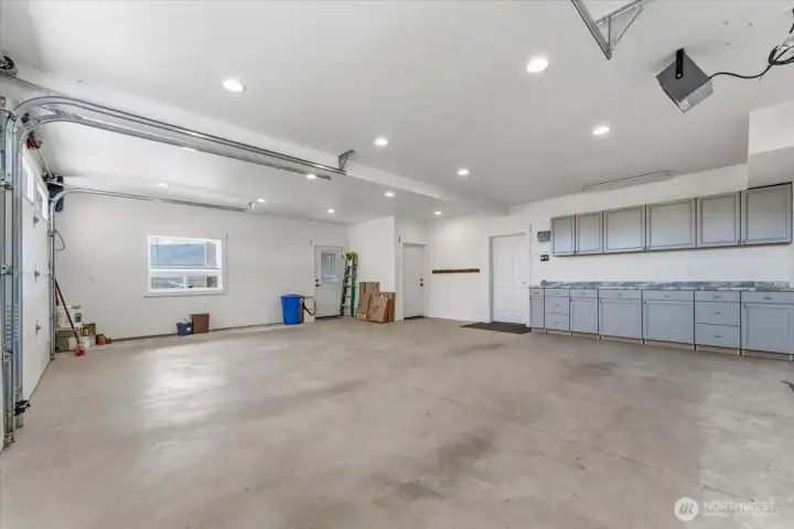 Main home fully finished garage with heater and large storage room, 728sqft garage.