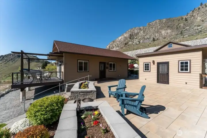 Lower level patio and courtyard area leading to the ADU/Guest House and additional detached "cabana" w/ raised planter beds. The area has been plumbed for a water fountain feature.