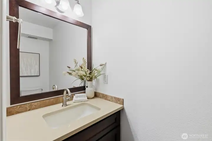 The 1/2 bathroom on the lower level supports the flex space/4th bedroom.