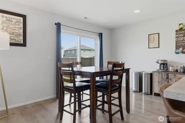 Dining room area with sliding doors to the backyard.