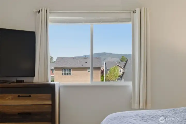 Scenic mountain views from the primary bedroom.