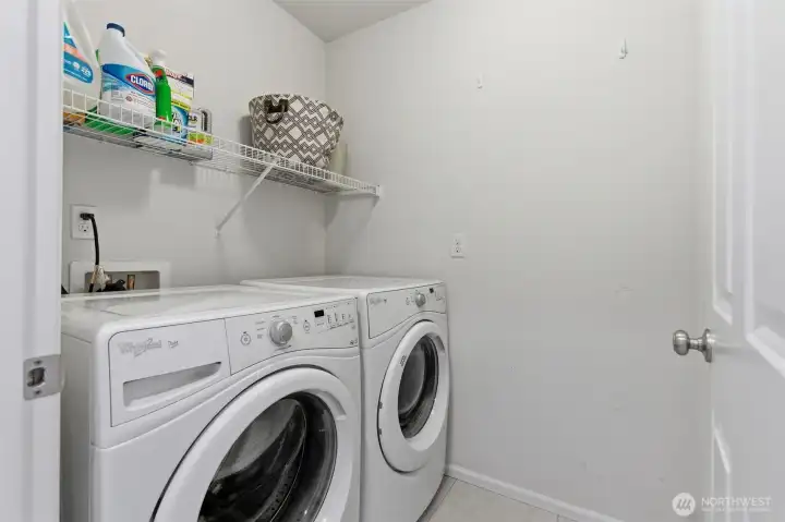 Laundry room conveniently located upstairs.