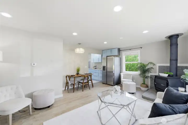 Throught the living room to the kitchen.
