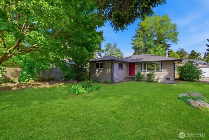 Enhansed photo to show what the front yard could look like with grass planted.