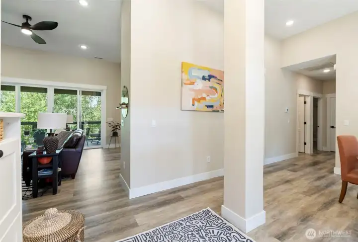 You'll step into an open foyer with vaulted ceilings