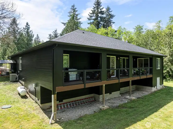 Look over your private, park-like backyard from the comfort of your gorgeous covered balcony.