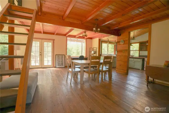 Kitchen area with stairs to the loft above. Kitchen area with stairs to the loft above.