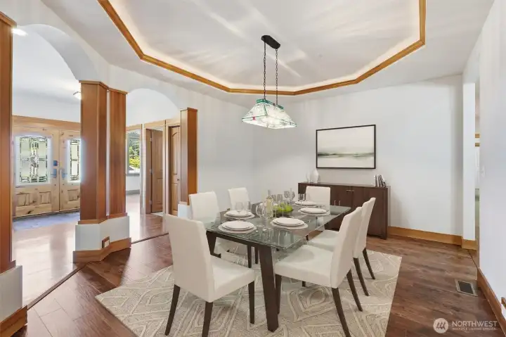 LARGE FORMAL DINING AREA, COFFERED CEILING, CAN EFFORTLESSLY SEAT EIGHT OR MORE.