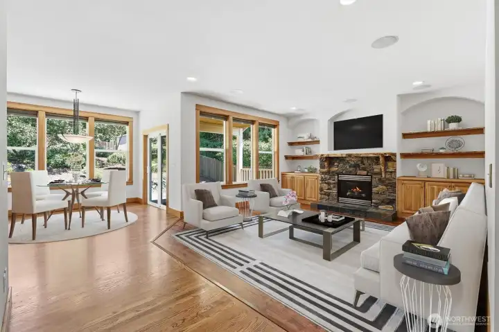 COMFORTABLE AND OPEN FAMILY ROOM WITH EASY ACCESS TO BACK DECK AND KITCHEN.