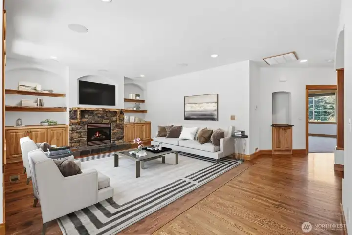 RELAXING FAMILY ROOM WITH GAS FIREPLACE, AND SPACE TO RELAX.
