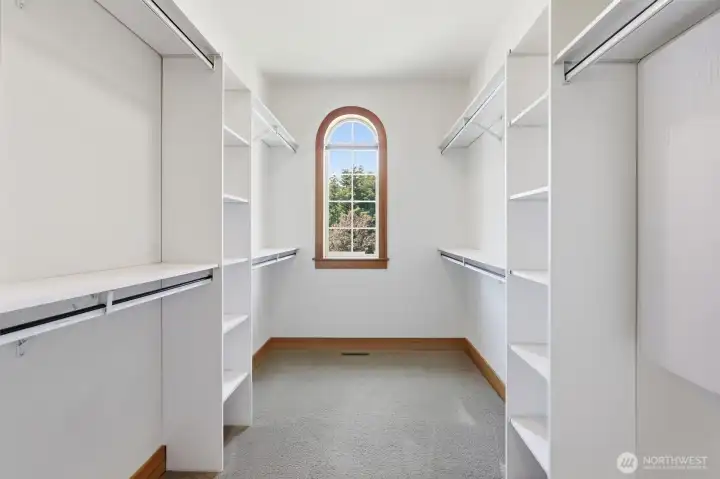 GENEROUS WALK-IN CLOSET FOR PRIMARY BEDROOM.