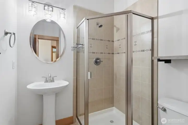 GUEST BATHROOM NEXT TO SECOND BEDROOM - ALSO HAS A SHOWER.