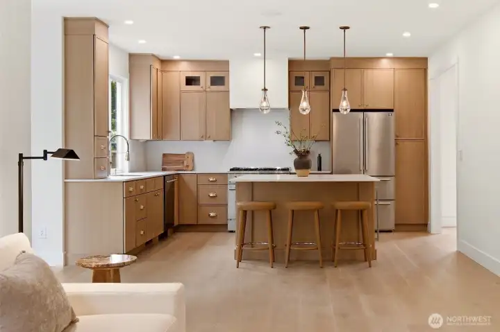 Open concept kitchen with bright breakfast nook