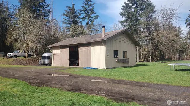 Detached shop with man-cave above