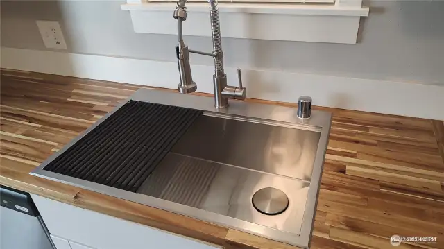 New farm-style stainless sink