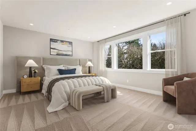 Top floor primary suite provides lots of natural light!