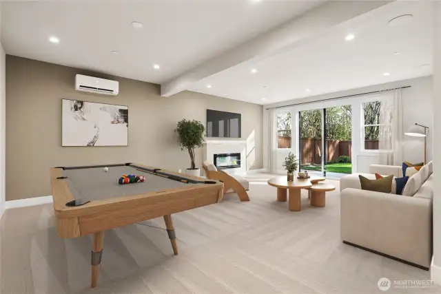 Lower level rec room has endless options to entertain and opens to the large fully landscaped and fenced lawn w/sprinklers.