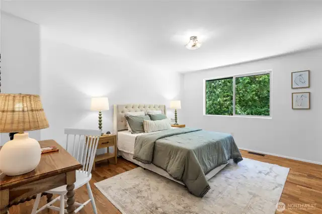 One of three spacious secondary bedrooms upstairs.