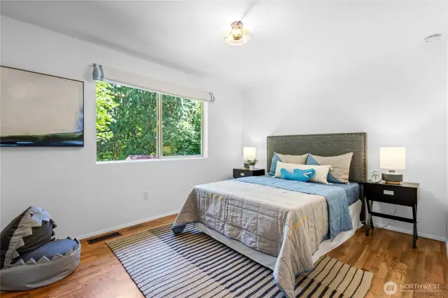 One of three spacious secondary bedrooms upstairs.