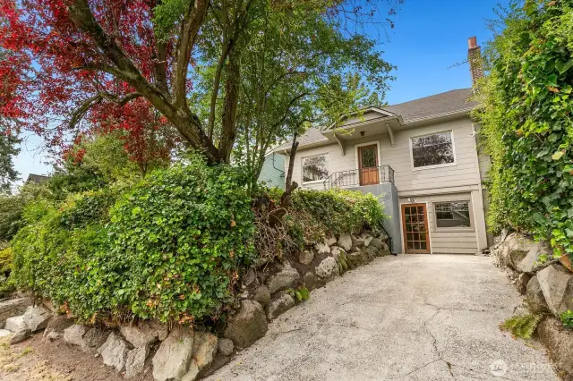 The lower level offers a separate entrance, two large non conforming bedrooms, laundry room and full bathroom with walk in shower.
