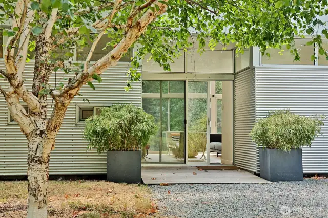 Covered entry porch. Take off your shoes and step through the glass doors onto your new LVP floors....