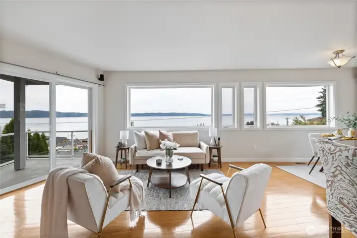 A wall of windows welcomes you into the space and out to the view.
