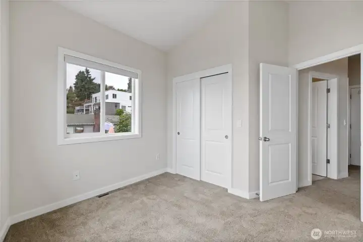 The Second bedroom has large windows with views and a good size closet