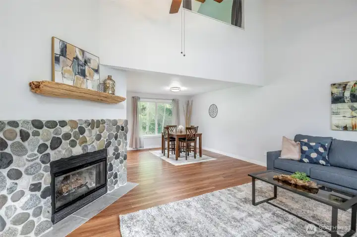 River rock fireplace with custom live-edge mantle