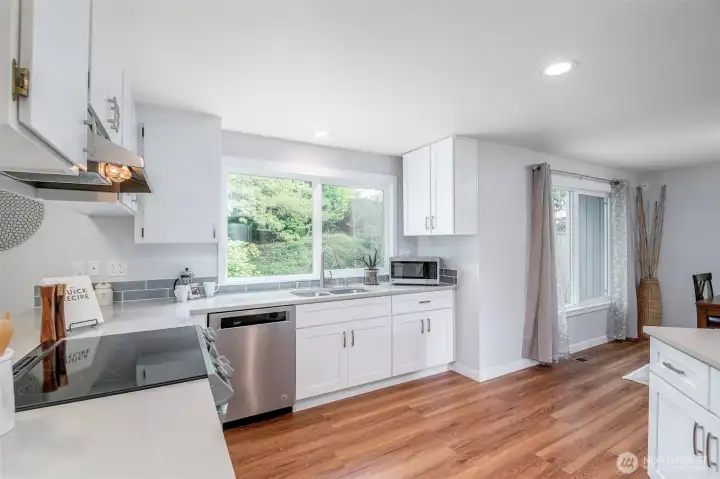 Updated kitchen with neautral color scheme allows for your personal touches